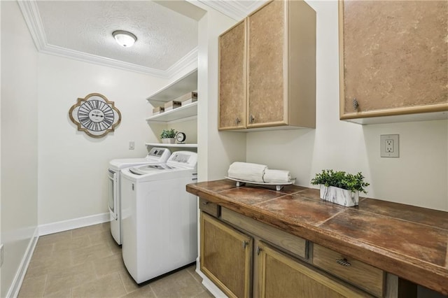 255 Broken Lance Pl, Johns Creek, GA 30022 - laundry area featuring washer and clothes dryer, cabinet space, crown molding, a textured ceiling, and baseboards