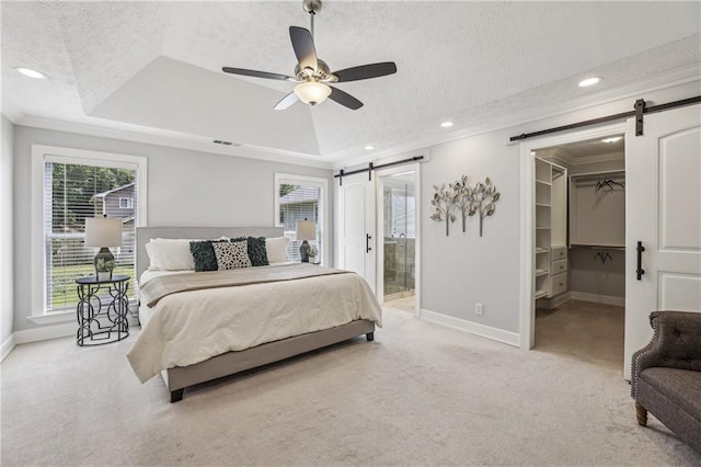 255 Broken Lance Pl, Johns Creek, GA 30022 - bedroom with a barn door, light colored carpet, baseboards, crown molding, and a textured ceiling