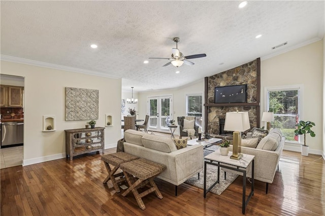 255 Broken Lance Pl, Johns Creek, GA 30022 - living room featuring wood-type flooring, a textured ceiling, ceiling fan, ornamental molding, and baseboards