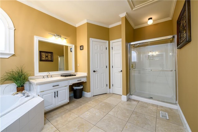 full bathroom with vanity, a shower stall, a garden tub, and ornamental molding