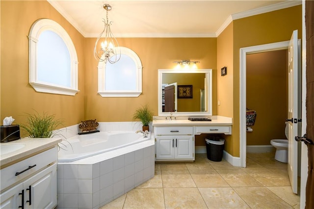 full bath with toilet, vanity, ornamental molding, and a garden tub
