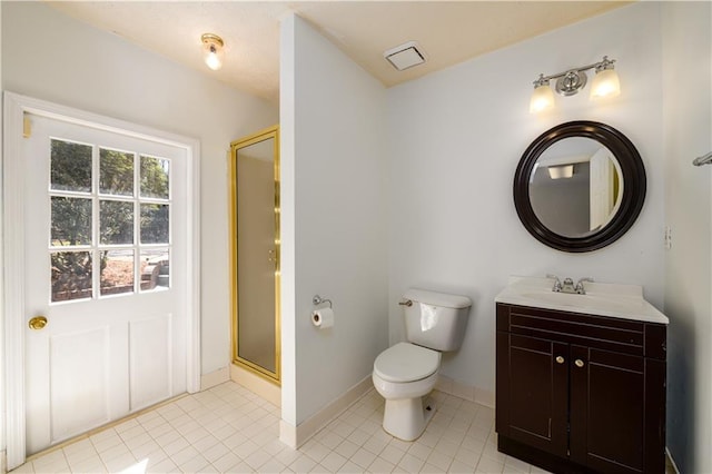 bathroom featuring vanity, toilet, baseboards, a shower stall, and tile patterned floors