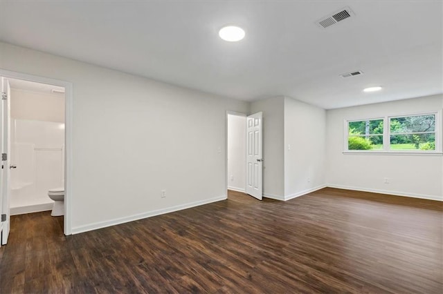 2091 Chestnut Log Dr, Lithia Springs, GA 30122 - unfurnished room with baseboards and dark wood-type flooring