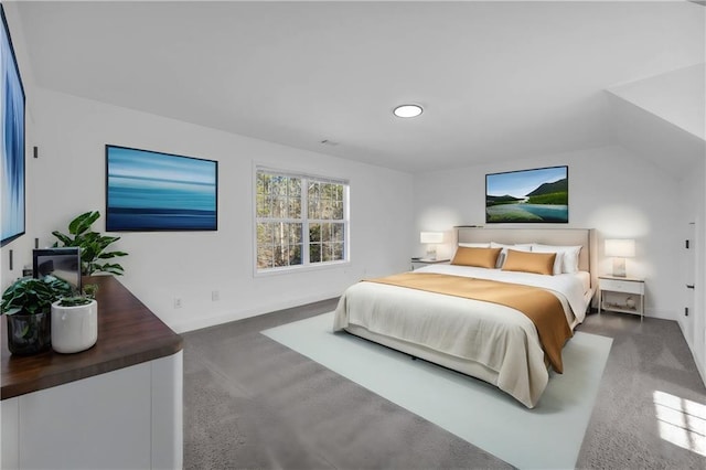 bedroom featuring lofted ceiling