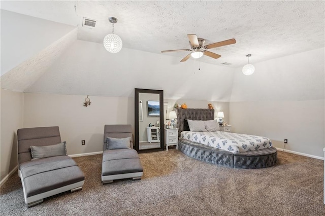 carpeted bedroom with lofted ceiling, baseboards, a textured ceiling, and ceiling fan