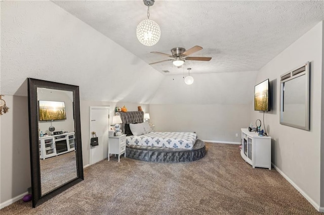 bedroom featuring carpet flooring, lofted ceiling, baseboards, and a textured ceiling