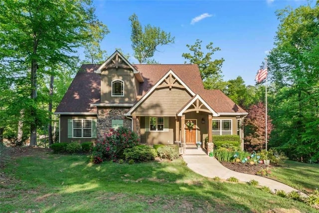 210 Lake Pines Rd, Jackson, GA 30233 - view of front of house featuring a front yard and stone siding