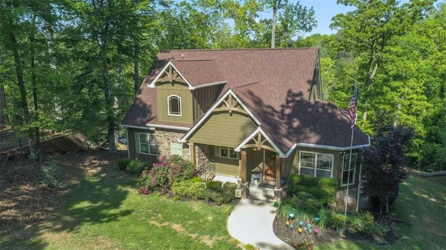 210 Lake Pines Rd, Jackson, GA 30233 - craftsman house featuring stone siding and a front yard
