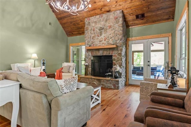210 Lake Pines Rd, Jackson, GA 30233 - living area with wood ceiling, hardwood / wood-style floors, french doors, high vaulted ceiling, and a chandelier