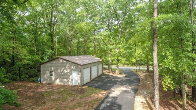 210 Lake Pines Rd, Jackson, GA 30233 - view of outdoor structure featuring a view of trees