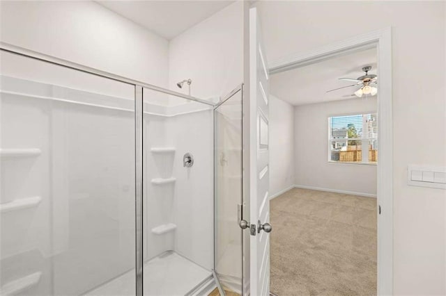 bathroom with ceiling fan and walk in shower