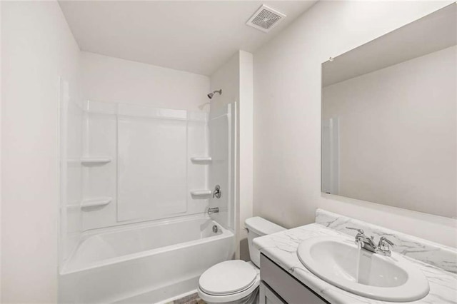 full bathroom with washtub / shower combination, vanity, and toilet