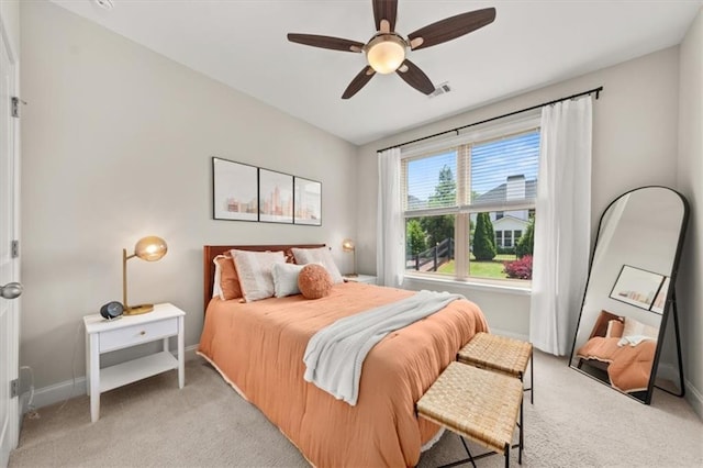 337 Spotted Ridge Cir, Woodstock, GA 30188 - bedroom with light colored carpet, baseboards, and ceiling fan