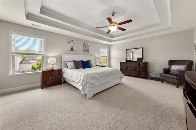 337 Spotted Ridge Cir, Woodstock, GA 30188 - carpeted bedroom featuring a raised ceiling, baseboards, and ceiling fan