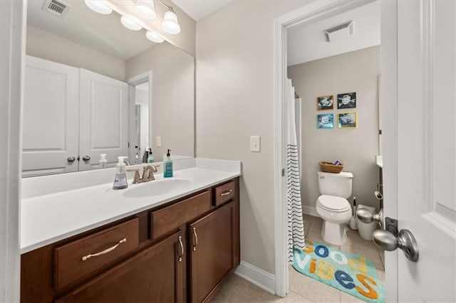 337 Spotted Ridge Cir, Woodstock, GA 30188 - bathroom with toilet, tile patterned floors, vanity, and baseboards