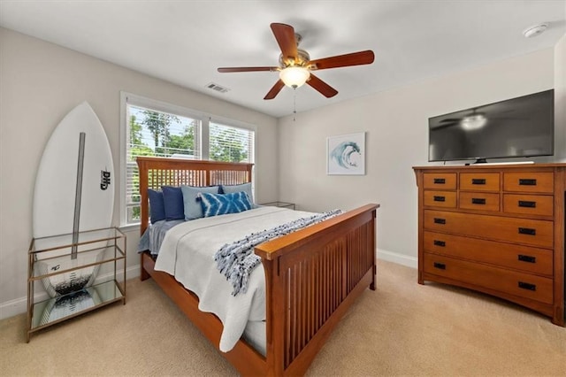 337 Spotted Ridge Cir, Woodstock, GA 30188 - bedroom with light carpet, baseboards, and a ceiling fan