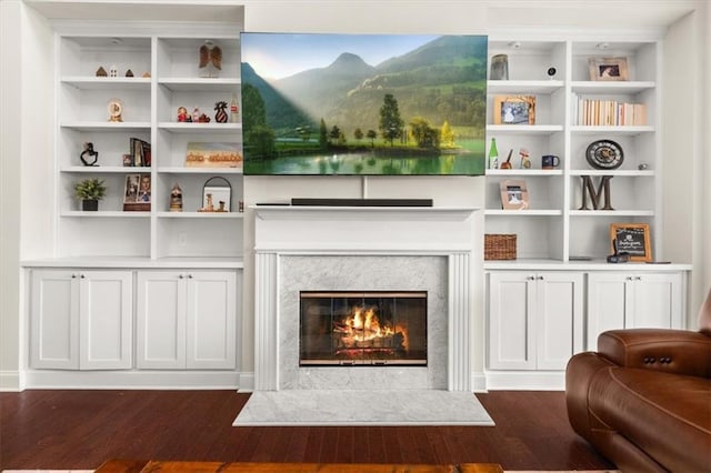337 Spotted Ridge Cir, Woodstock, GA 30188 - living area with dark wood-style floors and a high end fireplace