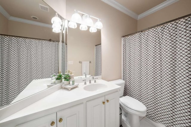 bathroom with crown molding, toilet, and vanity