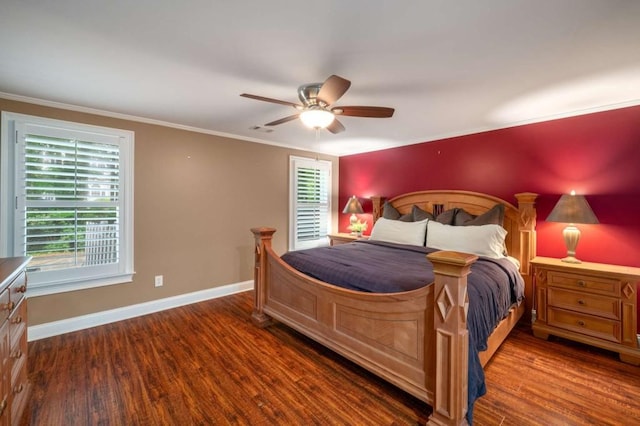 bedroom with wood finished floors, baseboards, ceiling fan, and ornamental molding