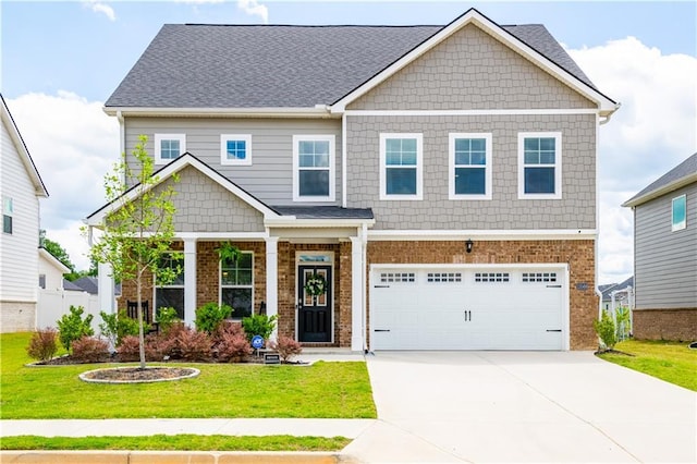 13568 Scenic Pkwy, Covington, GA 30014 - craftsman-style house with a front yard, a garage, driveway, and brick siding