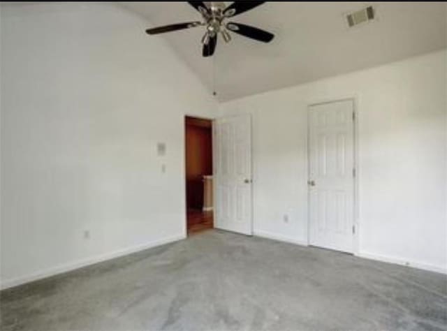 6684 Crane Ave, Fairburn, GA 30213 - unfurnished bedroom featuring baseboards, carpet, a ceiling fan, and high vaulted ceiling