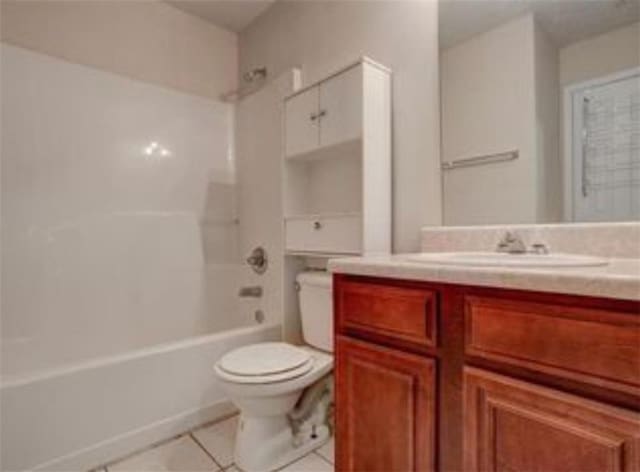 6684 Crane Ave, Fairburn, GA 30213 - bathroom featuring tile patterned floors, vanity, toilet, and shower / washtub combination