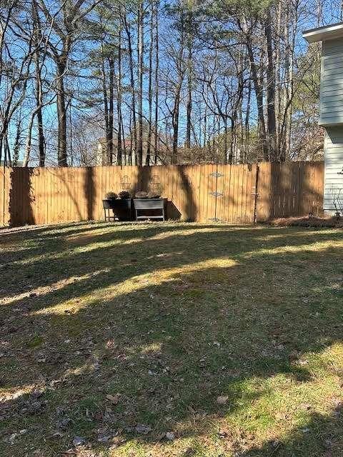 view of yard featuring a fenced backyard