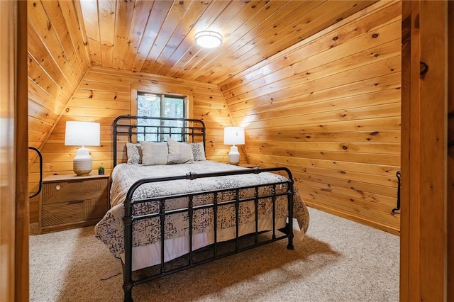 carpeted bedroom featuring vaulted ceiling, wood ceiling, and wood walls