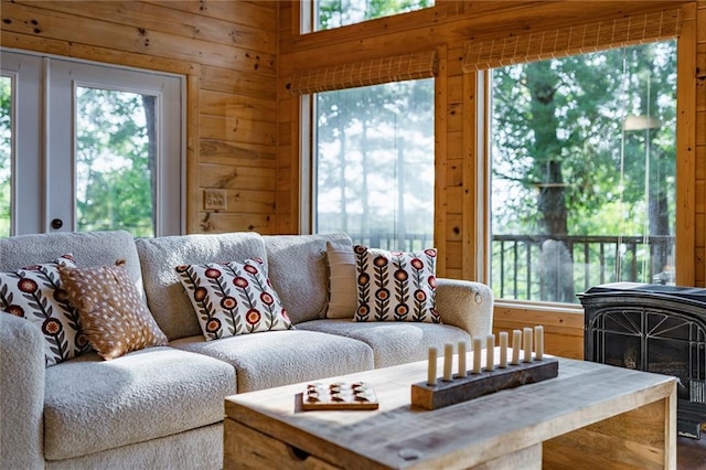 living area featuring wooden walls