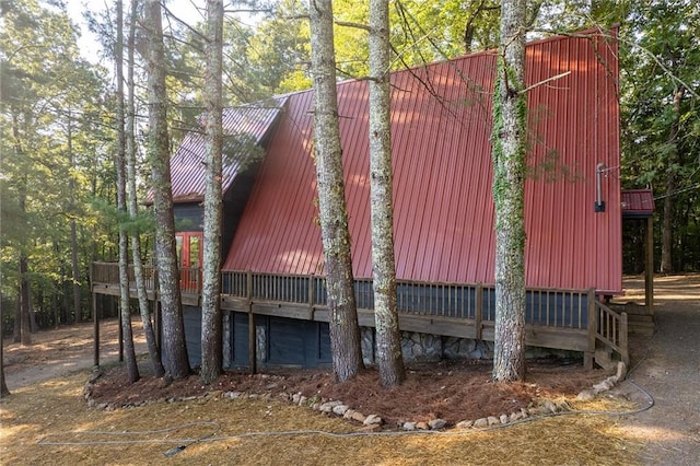 exterior space with metal roof