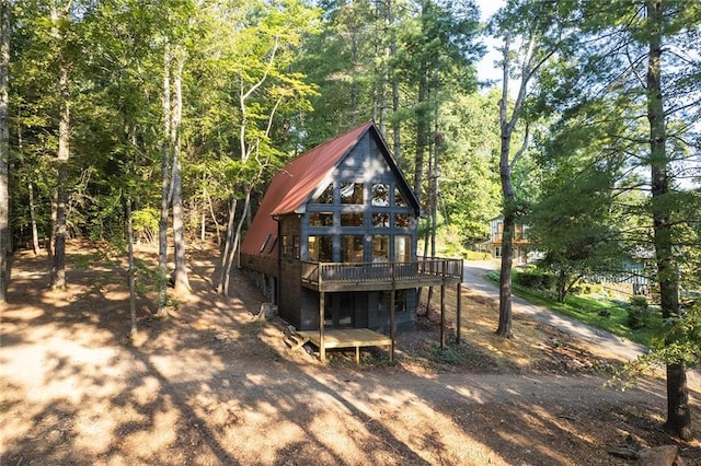 view of outbuilding with dirt driveway