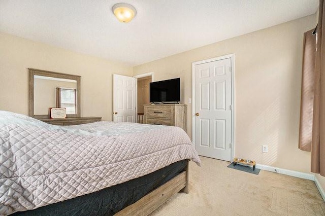 bedroom featuring carpet