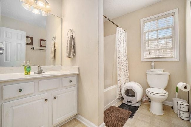 full bathroom with vanity, toilet, and shower / bath combo with shower curtain