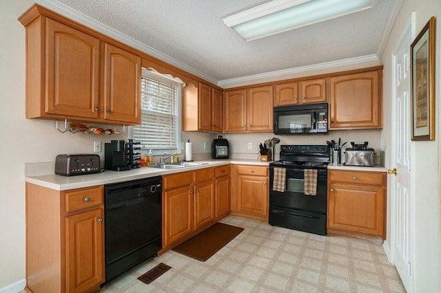 kitchen featuring ornamental molding, sink, a textured ceiling, and black appliances