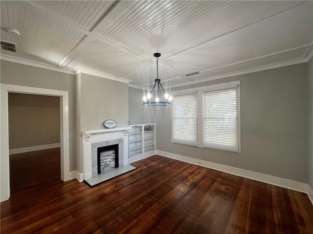 unfurnished living room with a premium fireplace, dark wood-style flooring, visible vents, and crown molding