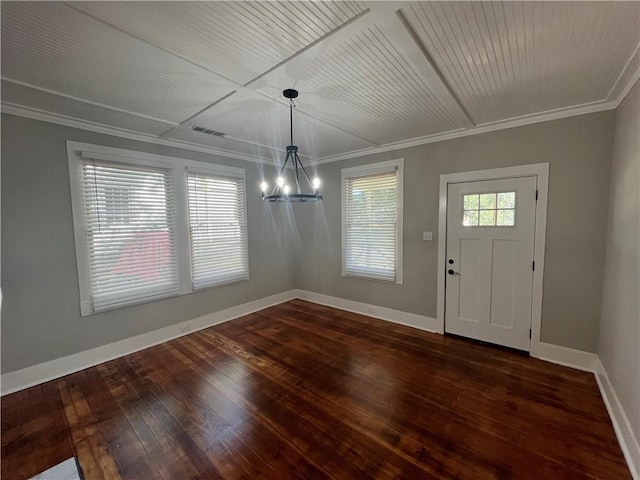 entryway with dark wood-style flooring, crown molding, a notable chandelier, visible vents, and baseboards