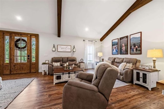 living room with dark wood-type flooring and vaulted ceiling with beams