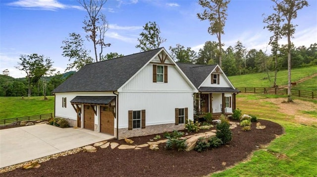 view of front of home with a front lawn and a patio area