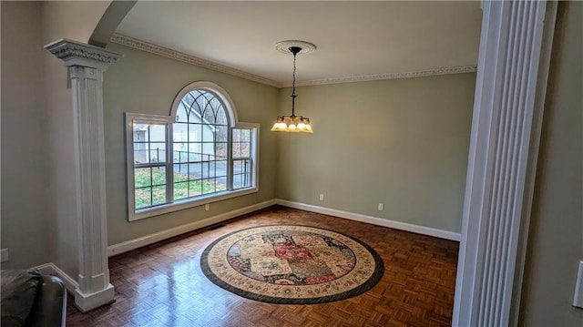 dining room featuring dark parquet floors, decorative columns, plenty of natural light, and crown molding