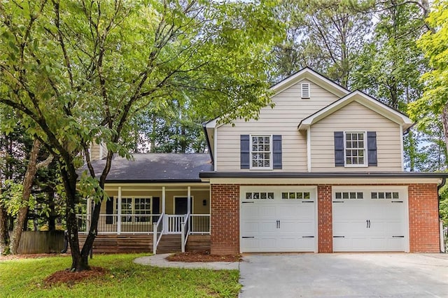 3614 Spring Leaf Ln, Acworth, GA 30101 - traditional home featuring concrete driveway, covered porch, an attached garage, and brick siding