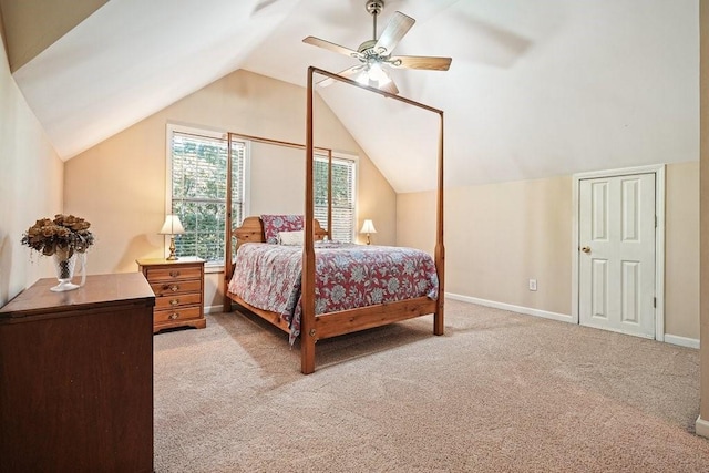 carpeted bedroom featuring ceiling fan and lofted ceiling