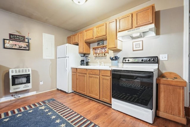 kitchen with light wood-type flooring, electric panel, heating unit, and white appliances