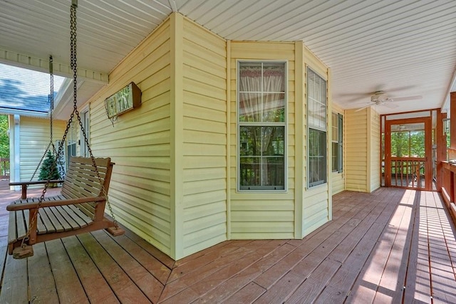 wooden terrace with ceiling fan