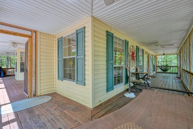 wooden deck with ceiling fan