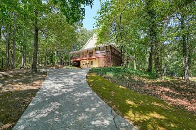 view of property exterior with a garage