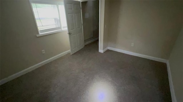 5924 Central Church Rd, Douglasville, GA 30135 - unfurnished bedroom with baseboards and carpet floors