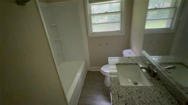 5924 Central Church Rd, Douglasville, GA 30135 - bathroom featuring toilet, healthy amount of natural light, baseboards, and vanity