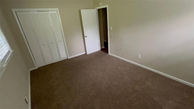 5924 Central Church Rd, Douglasville, GA 30135 - unfurnished bedroom with carpet floors, baseboards, and a closet