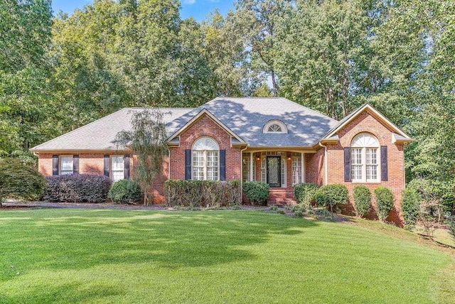 view of front of house with a front lawn