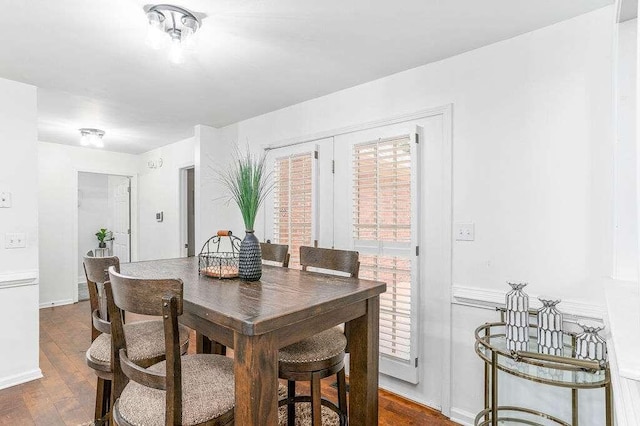 dining room featuring dark hardwood / wood-style floors